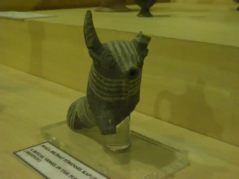 A figure of an animal with horns and stripes